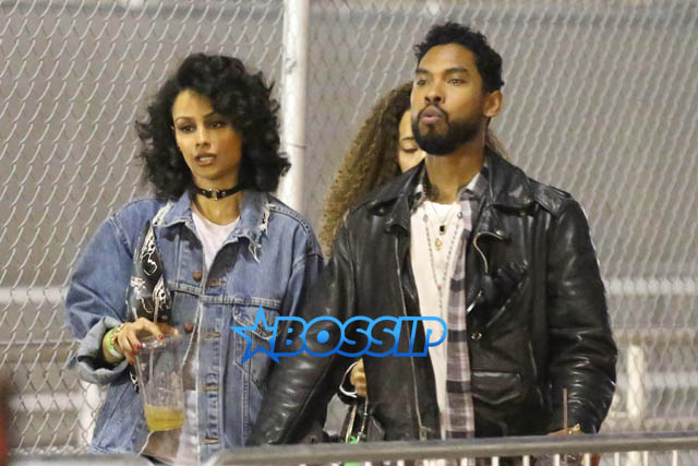 Miguel Jontel Pimentel, the singer known simply as ‘Miguel’ and his girlfriend Nazanin Mandhi hold hands as they leave Chris Brown, Trey Songz and Tyga's Between The Sheet Tour Stop at The Forum in Inglewood.