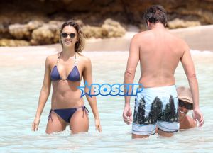 Actress and busy mom Jessica Alba shows off her bikini body while spending a day on the beach in the Caribbean with her husband Cash Warren and their daughters Honor & Haven on April 2, 2015.