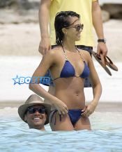 Actress and busy mom Jessica Alba shows off her bikini body while spending a day on the beach in the Caribbean with her husband Cash Warren and their daughters Honor & Haven on April 2, 2015.