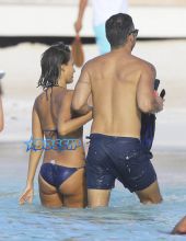 Actress and busy mom Jessica Alba shows off her bikini body while spending a day on the beach in the Caribbean with her husband Cash Warren and their daughters Honor & Haven on April 2, 2015.