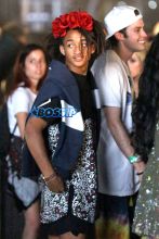Jaden Smith attends day 1 of the second weekend of the Coachella Music Festival with his friends and a bodyguard close by. Jade wore a bazar shirt that could mistaken for a dress and put on a flower headband to joy in on the fun.