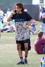 Jaden Smith attends day 1 of the second weekend of the Coachella Music Festival with his friends and a bodyguard close by. Jade wore a bazar shirt that could mistaken for a dress and put on a flower headband to joy in on the fun.