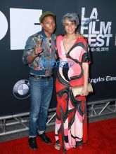 Producers Mimi Valdez and Pharrell Williams at Dope movie premiere