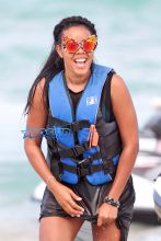 Angela Simmons bathing suit Miami cat eye sunglasses