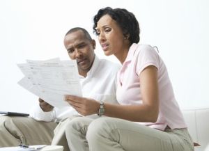 Black couple dealing with bills