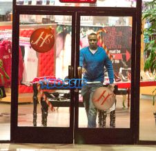 SplashNews Sean Combs &Kim Porter Shop At The Hustler Store
