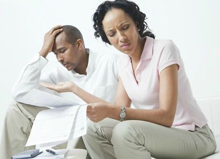 Black woman upset with bills