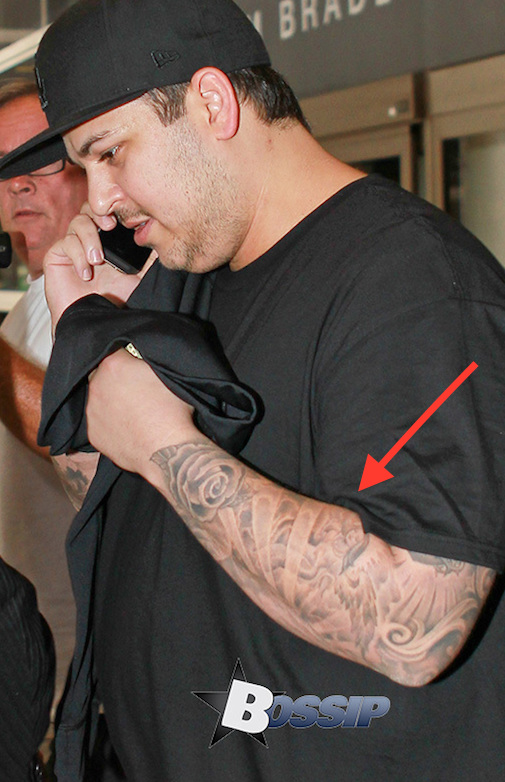 Los Angeles, CA - Rob Kardashian heads back to home to Los Angeles early and arrives at LAX. The Kardashian brother decided to bail out on his sister Kim Kardashian's wedding. Allegedly, some family drama occurred, and the young brother decided to head back home. Despite the wedding drama, at least Rob made it back to celebrate Memorial Day Weekend. AKM-GSI May 24, 2014 To License These Photos, Please Contact : Steve Ginsburg (310) 505-8447 (323) 423-9397 steve@akmgsi.com sales@akmgsi.com or Maria Buda (917) 242-1505 mbuda@akmgsi.com ginsburgspalyinc@gmail.com