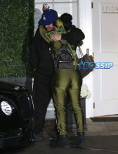 FameFlynetPictures Blac Chyna Rob Kardashian Green Jumpsuit PDA hugging kissing Epione Cosmetic Laser Center