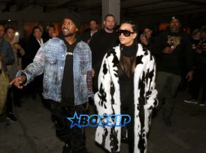 AKM-GSI Kim Kardashian NYFW Cruella De Vil Inspired Fur Coat Black and White Cornrows Cleavage Kanye West Yeezy SEason 2 Zine party