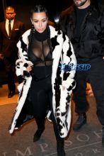 AKM-GSI Kim Kardashian NYFW Cruella De Vil Inspired Fur Coat Black and White Cornrows Cleavage