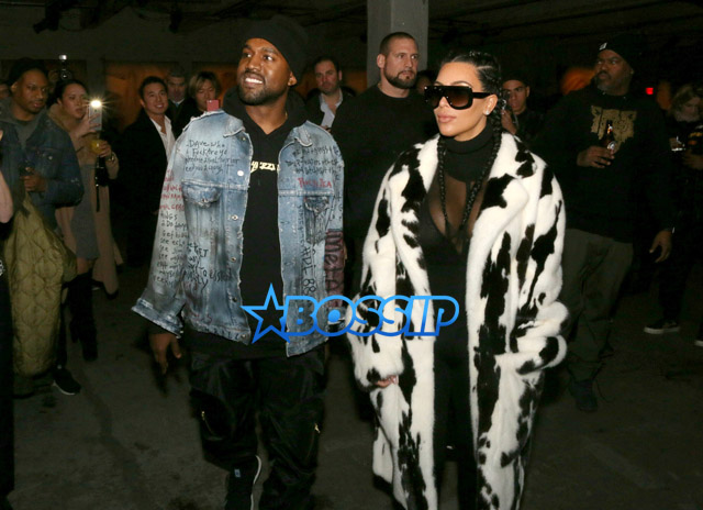 AKM-GSI Kim Kardashian NYFW Cruella De Vil Inspired Fur Coat Black and White Cornrows Cleavage Kanye West Yeezy Season 2