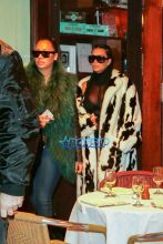 AKM-GSI Kim Kardashian NYFW Cruella De Vil Inspired Fur Coat Black and White Cornrows Cleavage La La Anthony Green Fur Cipriani