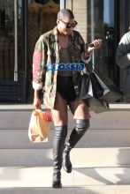 AKM-GSI EJ Johnson (Earvin johnson Jr) photographed shopping at Fred Segal and Barney's in shorts and knee high boots