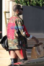 AKM-GSI EJ Johnson (Earvin johnson Jr) photographed shopping at Fred Segal and Barney's in shorts and knee high boots