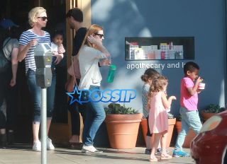 FameFlynetPictures Charlize Theron takes her kids Jackson and August out for ice cream in Hollywood, California on February 29, 2016.