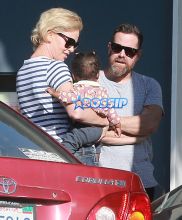 FameFlynetPictures Charlize Theron takes her kids Jackson and August out for ice cream in Hollywood, California on February 29, 2016.