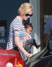 FameFlynetPictures Charlize Theron takes her kids Jackson and August out for ice cream in Hollywood, California on February 29, 2016.