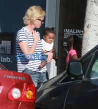 FameFlynetPictures Charlize Theron takes her kids Jackson and August out for ice cream in Hollywood, California on February 29, 2016.