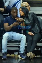 AKM-GSI Kevin Hart Eniko Parrish kiss court side Los Angeles Clippers Oklahoma City Thunder game