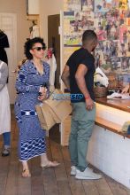 AKM-GSI wife Grace Miguel and Usher shop for children's clothes at Trico Field in Beverly Hills