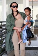 FameFlynetPictures Kim Kardashian West North West wear matching braids nude jumpsuits Encino