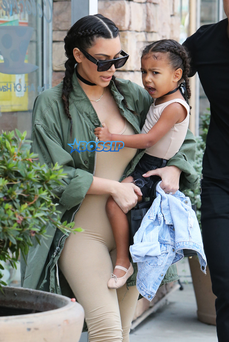 FameFlynetPictures Kim Kardashian West North West wear matching braids nude jumpsuits Encino