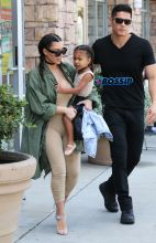 FameFlynetPictures Kim Kardashian West North West wear matching braids nude jumpsuits Encino