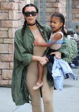 FameFlynetPictures Kim Kardashian West North West wear matching braids nude jumpsuits Encino