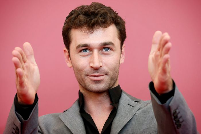 Actor James Deen poses during a photocall during the 70th Venice Film Festival in Venice August 30, 2013. Actors Deen and Tenille Houston are in Paul Schrader's movie "The Canyons", which debuts at the festival.  REUTERS/Alessandro Bianchi (ITALY - Tags: ENTERTAINMENT SOCIETY) - RTX131HU