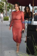 AKM-GSI red diamond dress Kim Kardashian Red Sheer Dress Carla DiBello Naomi Campbell book