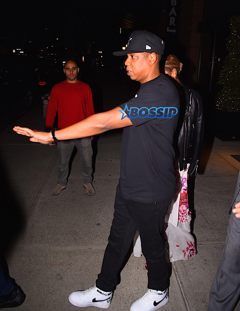 Beyonce and Jay Z are dinner date at Del Posto restaurant in New York City. Beyonce in a black leather jacket over a pink and white floral print dress; while Jay-Z dressed comfortably in a  'Greatness Is A Process' graphic tee, track pants and a black cap.    AKM-GSI 