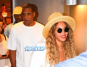 Jay Z and Beyonce leave their midtown office for his niece's graduation party. yellow pants white top white blazer straw hat and yellow handbag. AKM-GSI 27 MAY 2016