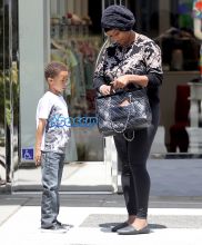 Model Toccara Jones boy Beverly Hills, California on May 26, 2016. black hat, black top leggings Toms shoes. FameFlynet