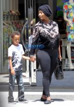 Model Toccara Jones boy Beverly Hills, California on May 26, 2016. black hat, black top leggings Toms shoes. FameFlynet
