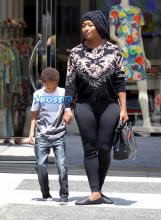 Model Toccara Jones boy Beverly Hills, California on May 26, 2016. black hat, black top leggings Toms shoes. FameFlynet