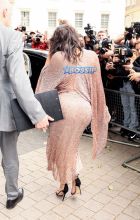 Splash News Kim Kardashian leaving Royal Geographical Society in London with partner, Kanye West, after attending a Conde Nast talk. Carla DiBello