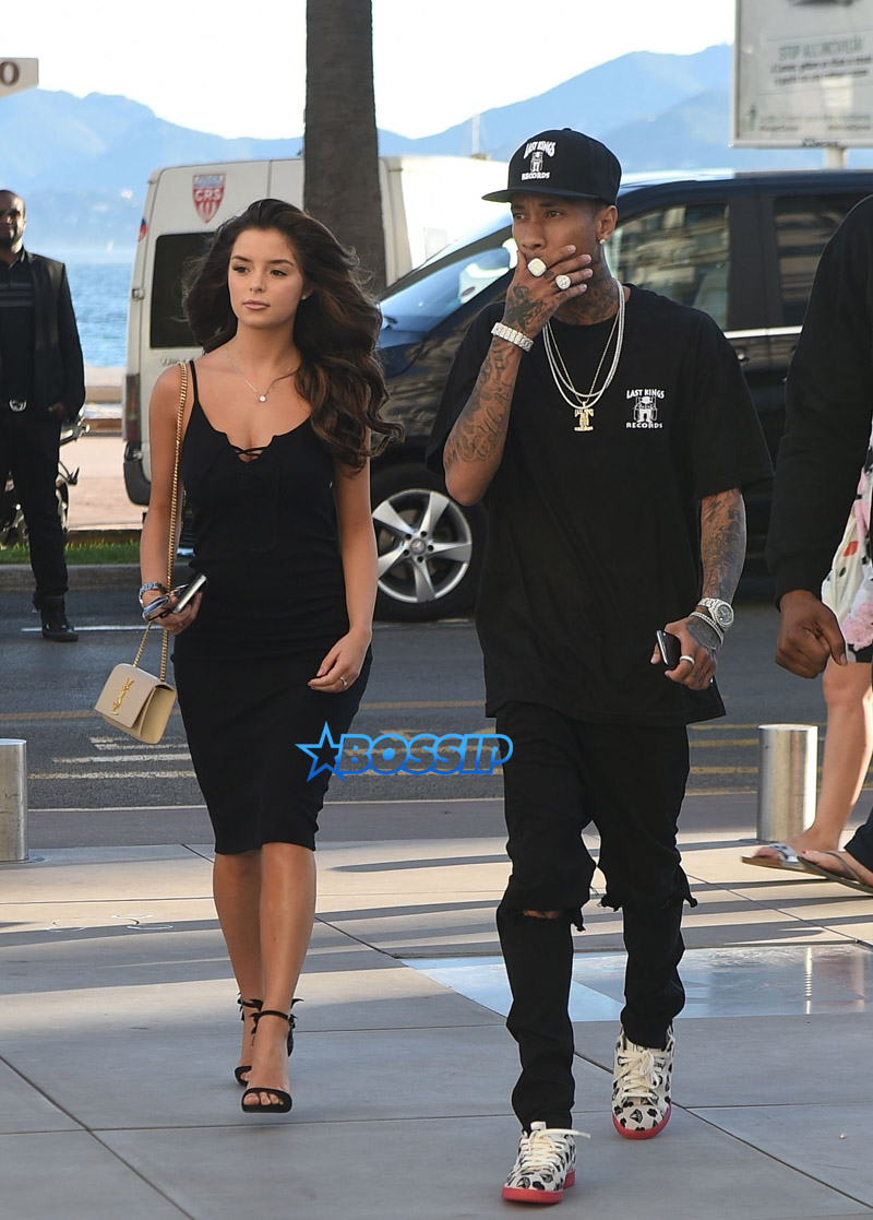 SplashNews Tyga takes Demi Rose shopping at Saint Laurent in Cannes