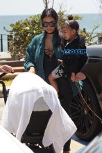 WENN crying north Kim Kardashian West Kanye West North West Saint West Nobu Malibu Chrissy Teigen John Legend Baby Luna