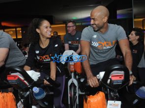 Misty Copeland and Olu Evans ride at a 2016 Cycle for Survival event at Equinox Bryant†Park on Sunday, March 13, 2016, in New York (Diane Bondareff/AP Images for Cycle for Survival)