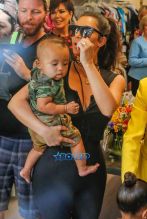 Kim, Kourtney and Khloe Kardashian attend their grandmother Mary Jo Campbell's store opening in San Diego with mother Kris Jenner, Corey Gamble, Scott Disick and their children. Kim carried little Saint as Khloe walked with Nori, Mason and Penelope. AKM-GSI