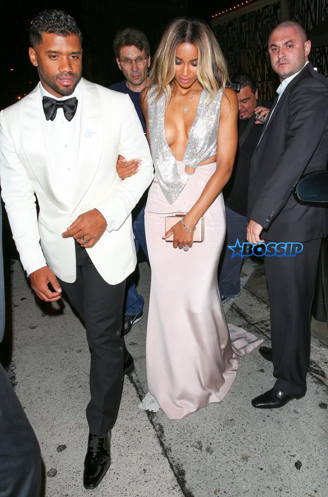 West Hollywood, CA - West Hollywood, CA - Newly married couple, Ciara and Russell Wilson, lock arms after a post-ESPYS award dinner at Craig's Restaurant in West Hollywood. Ciara showed off some serious skin in a daring low-cut gown, while the Seahawks QB looked dapper in a white tuxedo jacket and black bow-tie. AKM-GSI 13 JULY 2016 To License These Photos, Please Contact : Maria Buda (917) 242-1505 mbuda@akmgsi.com or Mark Satter (317) 691-9592 msatter@akmgsi.com sales@akmgsi.com