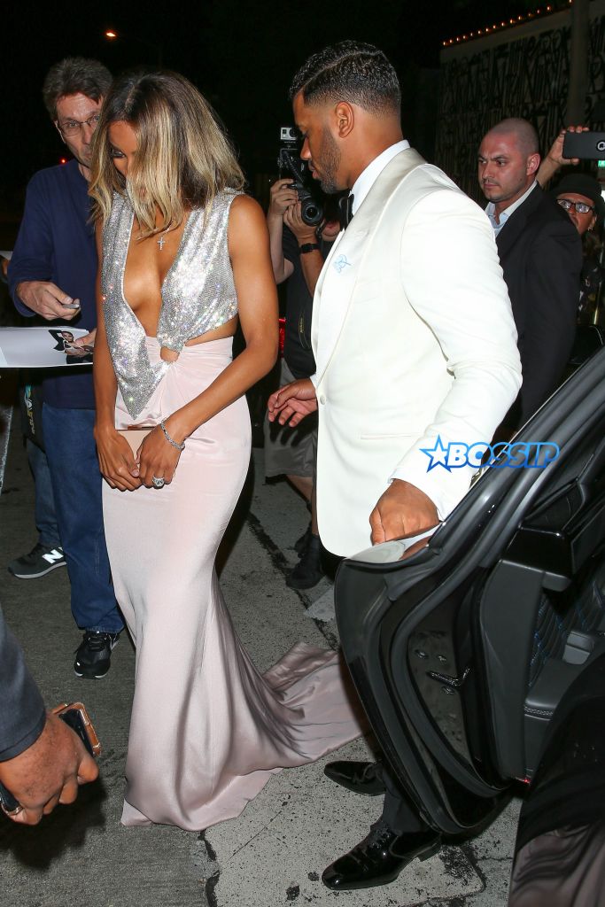 West Hollywood, CA - West Hollywood, CA - Newly married couple, Ciara and Russell Wilson, lock arms after a post-ESPYS award dinner at Craig's Restaurant in West Hollywood. Ciara showed off some serious skin in a daring low-cut gown, while the Seahawks QB looked dapper in a white tuxedo jacket and black bow-tie. AKM-GSI 13 JULY 2016 To License These Photos, Please Contact : Maria Buda (917) 242-1505 mbuda@akmgsi.com or Mark Satter (317) 691-9592 msatter@akmgsi.com sales@akmgsi.com