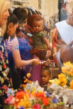 Kim, Kourtney and Khloe Kardashian attend their grandmother Mary Jo Campbell's store opening in San Diego with mother Kris Jenner, Corey Gamble, Scott Disick and their children. Kim carried little Saint as Khloe walked with Nori, Mason and Penelope. AKM-GSI