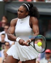Serena Williams of the U.S returns to Angelique Kerber of Germany during the women's singles final on day thirteen of the Wimbledon Tennis Championships in London, Saturday, July 9, 2016. (Adam Davy/Pool Photo via AP)