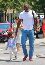 Actor Idris Elba son Winston friend in New York City, New York on July 6, 2016. Winston daddy ride on his shoulders. FameFlynet