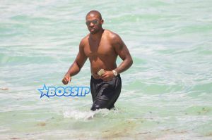 Dallas Cowboys Orlando Scandrick fiance Draya Michele in Miami Beach, FL. cutout bright yellow swimsuit SplashNEws