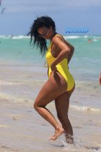 Dallas Cowboys Orlando Scandrick fiance Draya Michele in Miami Beach, FL. cutout bright yellow swimsuit SplashNEws