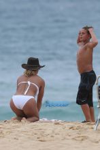 Kauai, HI Britney Spears vacation Hawaii scrappy white bikini, hot pink shorts cowboy hat toned body beach kids played sand FameFlynet/AKM-GSI