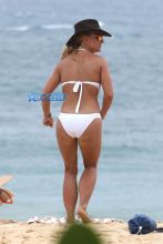 Kauai, HI Britney Spears vacation Hawaii scrappy white bikini, hot pink shorts cowboy hat toned body beach kids played sand FameFlynet/AKM-GSI